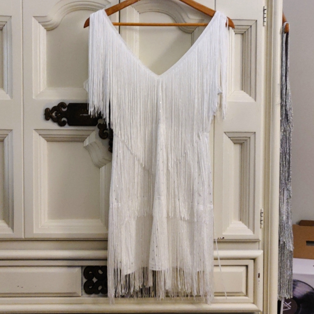Small white Fringe dress. Never worn